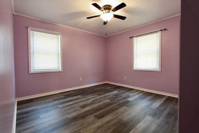 3961 Painter Branch Rd, Crestview, FL 32539 - spare room with healthy amount of natural light, a ceiling fan, crown molding, dark wood-style floors, and baseboards