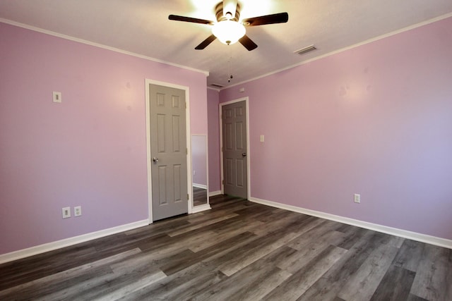 3961 Painter Branch Rd, Crestview, FL 32539 - spare room with ceiling fan, dark wood-style flooring, baseboards, and crown molding