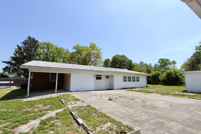 3961 Painter Branch Rd, Crestview, FL 32539 - view of front of home with metal roof and a chimney