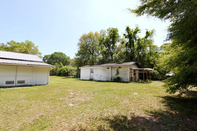 3961 Painter Branch Rd, Crestview, FL 32539 - view of grassy yard with an outdoor structure