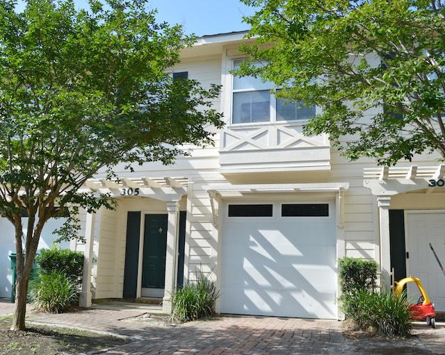 305 Mattie M Kelly Blvd, Destin, FL 32541 - view of property featuring an attached garage
