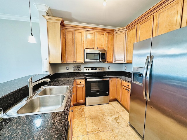 305 Mattie M Kelly Blvd, Destin, FL 32541 - kitchen featuring appliances with stainless steel finishes, a sink, pendant lighting, ornamental molding, and dark stone counters