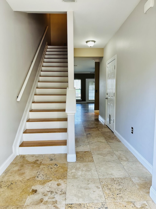 305 Mattie M Kelly Blvd, Destin, FL 32541 - staircase featuring baseboards and stone finish flooring