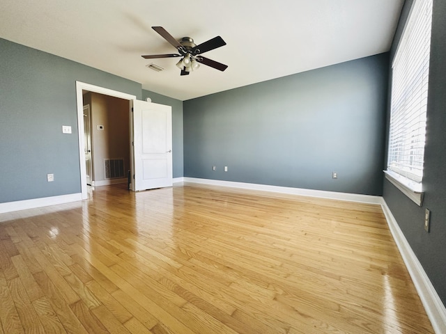 305 Mattie M Kelly Blvd, Destin, FL 32541 - spare room featuring light wood-style floors, ceiling fan, and baseboards
