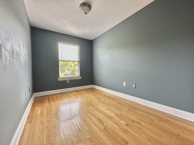 305 Mattie M Kelly Blvd, Destin, FL 32541 - spare room featuring light wood-style flooring and baseboards