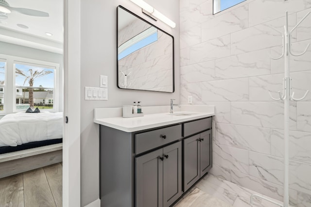 1926 Pathways Dr, Inlet Beach, FL 32461 - ensuite bathroom featuring marble finish flooring and vanity