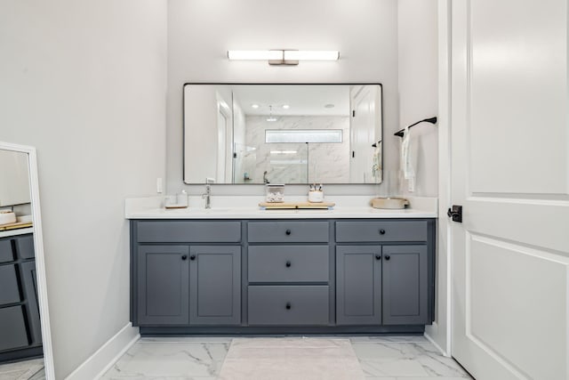 1926 Pathways Dr, Inlet Beach, FL 32461 - full bath featuring marble look tile flooring, double vanity, a marble finish shower, and baseboards