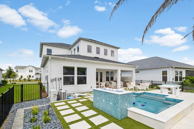 1926 Pathways Dr, Inlet Beach, FL 32461 - back of property with a pool with connected hot tub and a patio