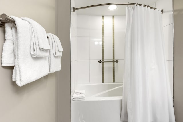 full bath featuring shower / bath combo with shower curtain