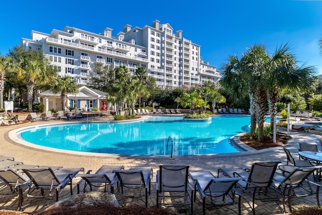 community pool with a patio