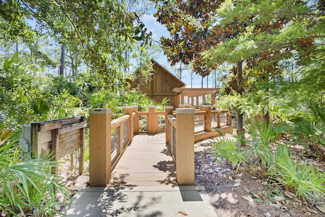 view of home's community featuring a wooden deck
