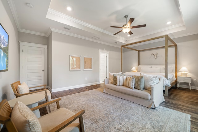 410 Coastal Breeze Dr, Freeport, FL 32439 - bedroom featuring wood finished floors, baseboards, a tray ceiling, ornamental molding, and ceiling fan