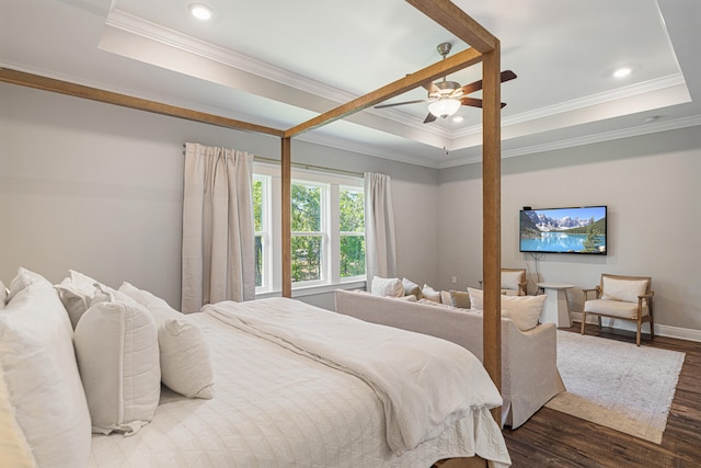 410 Coastal Breeze Dr, Freeport, FL 32439 - bedroom featuring a raised ceiling, dark wood finished floors, baseboards, crown molding, and recessed lighting