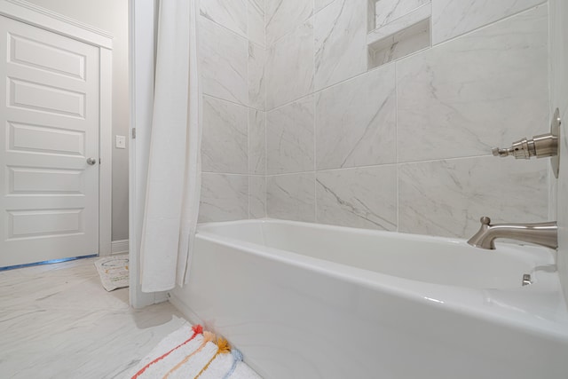 410 Coastal Breeze Dr, Freeport, FL 32439 - full bathroom with marble look tile flooring and shower / tub combo with curtain