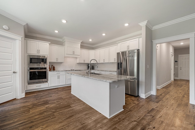 410 Coastal Breeze Dr, Freeport, FL 32439 - kitchen featuring stainless steel appliances, a sink, white cabinetry, crown molding, and recessed lighting