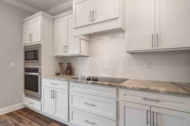 410 Coastal Breeze Dr, Freeport, FL 32439 - kitchen featuring stainless steel appliances, crown molding, dark wood-style flooring, tasteful backsplash, and light stone counters
