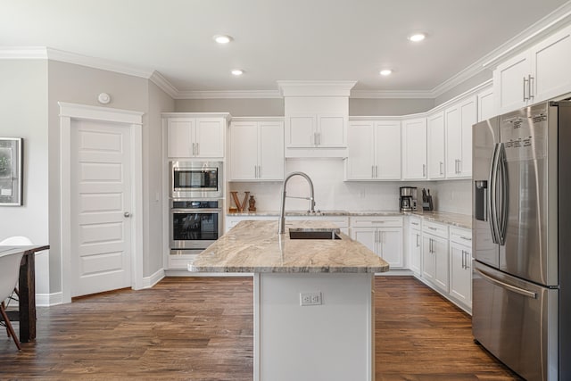 410 Coastal Breeze Dr, Freeport, FL 32439 - kitchen with appliances with stainless steel finishes, a sink, ornamental molding, white cabinets, and recessed lighting