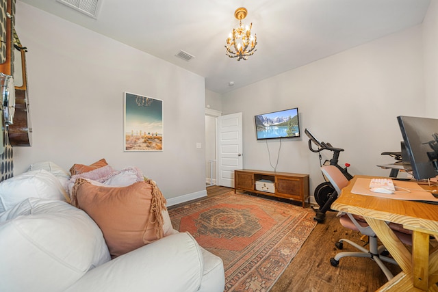 410 Coastal Breeze Dr, Freeport, FL 32439 - office area with wood finished floors, a chandelier, and baseboards