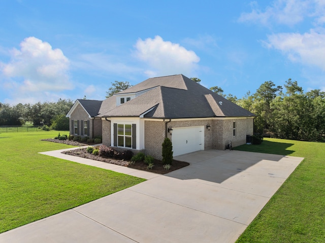 410 Coastal Breeze Dr, Freeport, FL 32439 - view of side of home featuring brick siding, concrete driveway, an attached garage, and roof with shingles