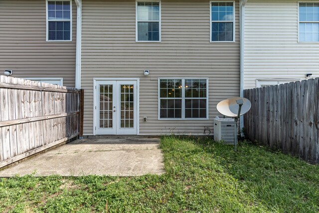 282 Swaying Pine Ct, Crestview, FL 32539 - rear view of property with a patio area, french doors, and central AC unit