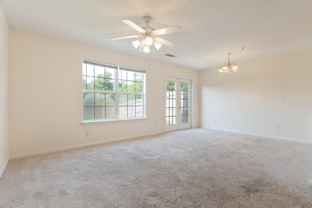 282 Swaying Pine Ct, Crestview, FL 32539 - carpeted spare room with a chandelier, a textured ceiling, baseboards, and a ceiling fan