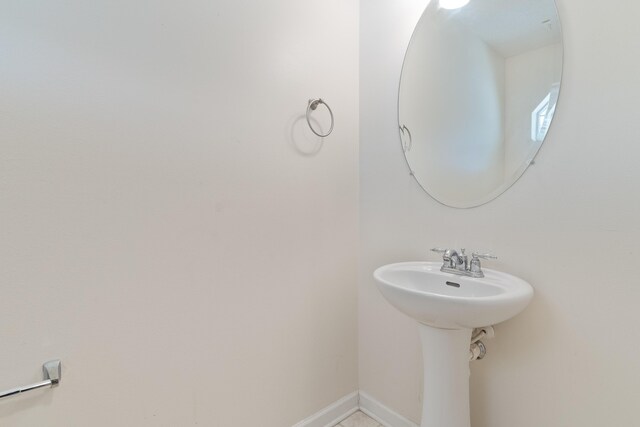 282 Swaying Pine Ct, Crestview, FL 32539 - bathroom with baseboards and a sink