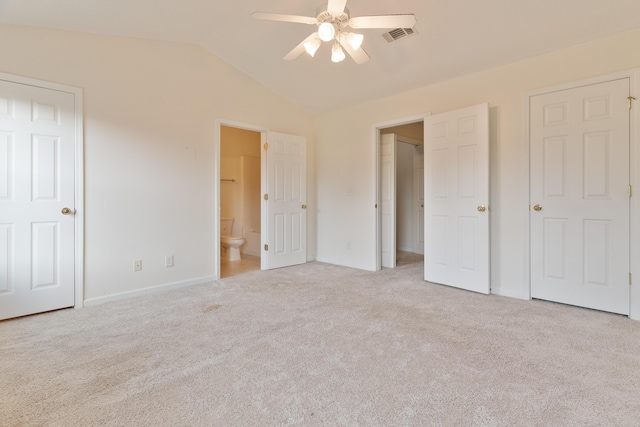 282 Swaying Pine Ct, Crestview, FL 32539 - unfurnished bedroom with carpet floors, lofted ceiling, baseboards, connected bathroom, and ceiling fan