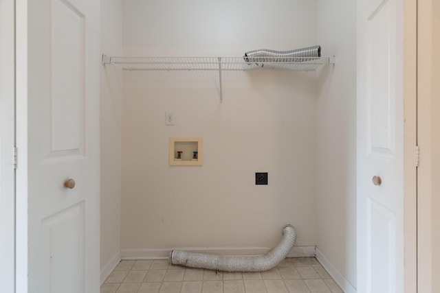 282 Swaying Pine Ct, Crestview, FL 32539 - washroom with hookup for an electric dryer, hookup for a washing machine, light tile patterned flooring, and baseboards