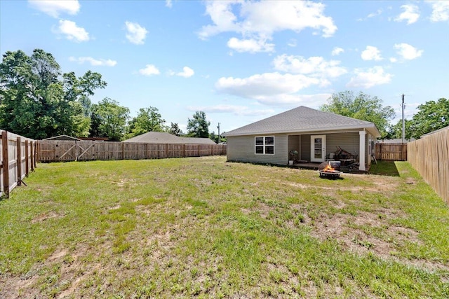 3163 Haskell Langley Rd, Crestview, FL 32539 - back of property featuring an outdoor fire pit
