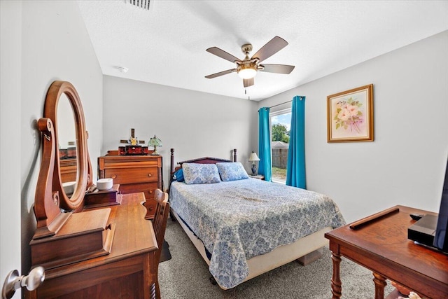 3163 Haskell Langley Rd, Crestview, FL 32539 - bedroom featuring carpet flooring, a ceiling fan, and a textured ceiling