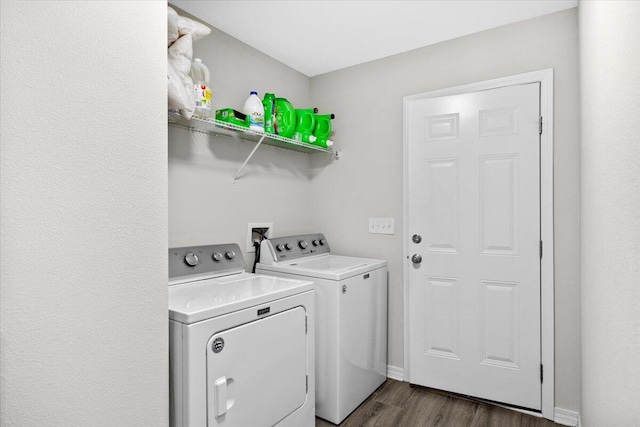 3163 Haskell Langley Rd, Crestview, FL 32539 - washroom with washing machine and clothes dryer and dark wood-style floors