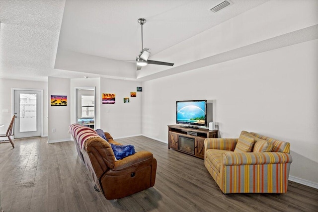 3163 Haskell Langley Rd, Crestview, FL 32539 - living area featuring wood finished floors, baseboards, and a ceiling fan