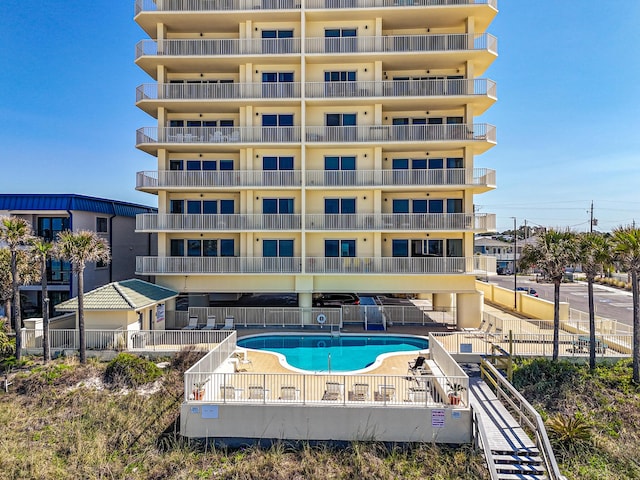 8601 Surf Dr Unit 2W, Panama City Beach, FL 32408 - community pool featuring fence