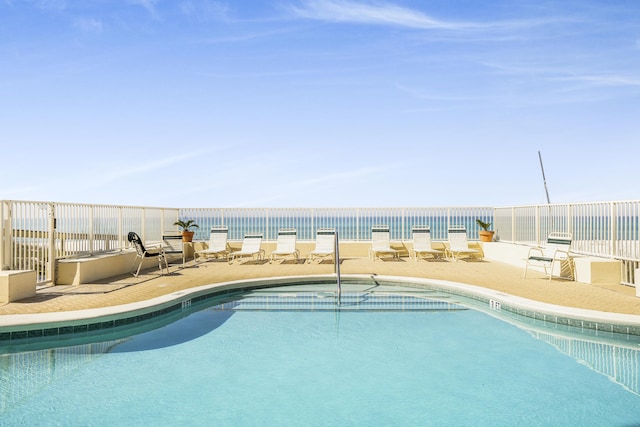 8601 Surf Dr Unit 2W, Panama City Beach, FL 32408 - community pool featuring a patio area