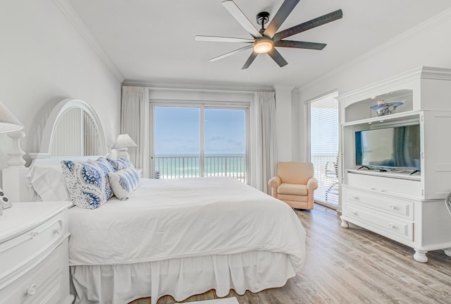 8601 Surf Dr Unit 2W, Panama City Beach, FL 32408 - bedroom with crown molding, access to exterior, light wood finished floors, and a ceiling fan
