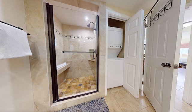 1096 Scenic Gulf Dr Unit 606, Miramar Beach, FL 32550 - full bath featuring stacked washer / drying machine and a shower stall