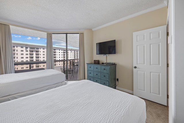 1096 Scenic Gulf Dr Unit 606, Miramar Beach, FL 32550 - tiled bedroom with a textured ceiling, access to outside, ornamental molding, and a wall of windows