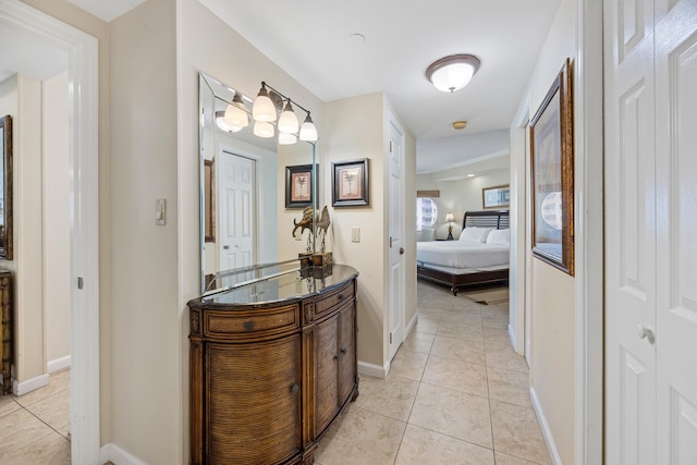1096 Scenic Gulf Dr Unit 606, Miramar Beach, FL 32550 - corridor with light tile patterned floors and baseboards