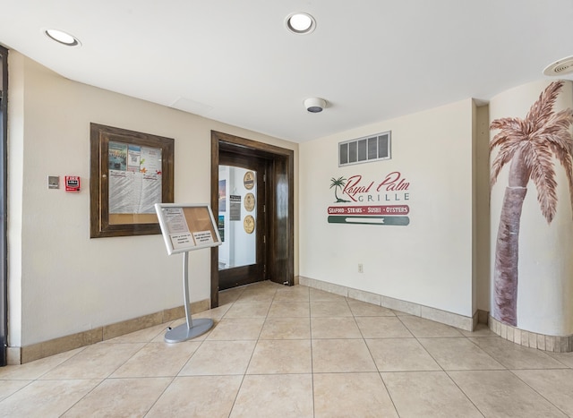 1096 Scenic Gulf Dr Unit 606, Miramar Beach, FL 32550 - entryway with baseboards, light tile patterned flooring, and recessed lighting