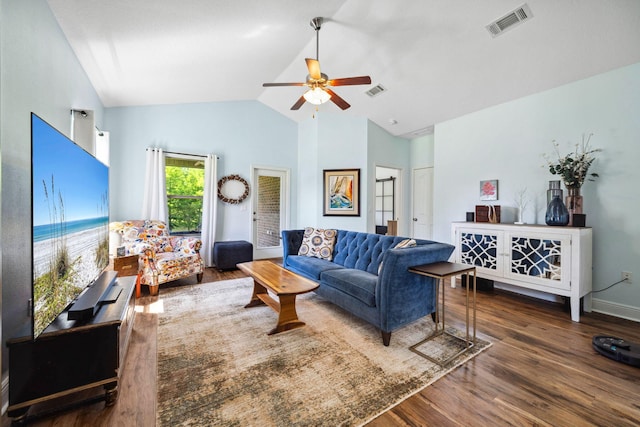 living area with ceiling fan, wood finished floors, high vaulted ceiling, and baseboards