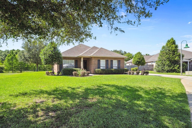 view of front of home featuring brick siding