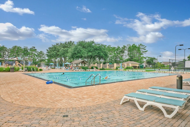 community pool with fence