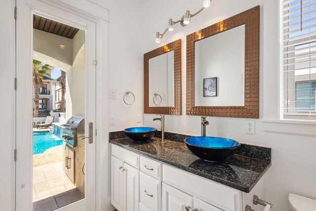 4782 Ocean Blvd, Destin, FL 32541 - full bathroom with double vanity and toilet