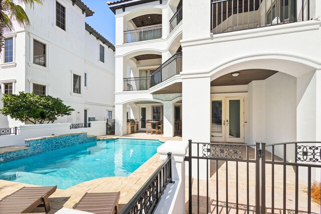 4782 Ocean Blvd, Destin, FL 32541 - swimming pool with french doors, a patio area, and fence