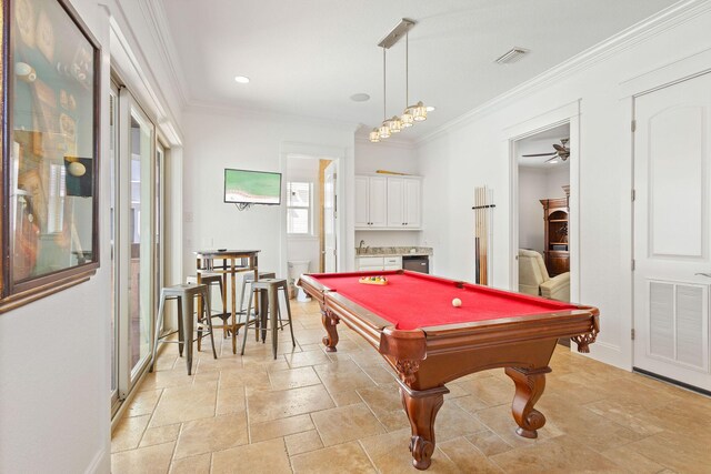 4782 Ocean Blvd, Destin, FL 32541 - recreation room with ornamental molding, ceiling fan, billiards, stone tile floors, and recessed lighting