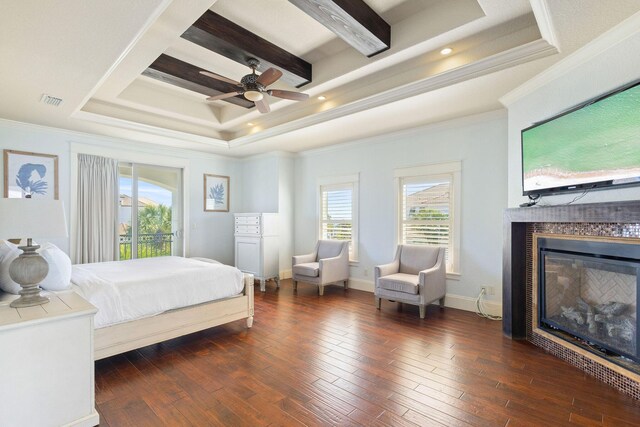 4782 Ocean Blvd, Destin, FL 32541 - bedroom featuring a glass covered fireplace, crown molding, coffered ceiling, dark wood-type flooring, and beam ceiling