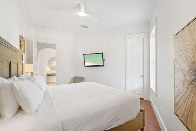 4782 Ocean Blvd, Destin, FL 32541 - bedroom with ornamental molding, wood finished floors, baseboards, and ceiling fan