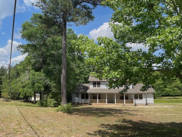 5882 Willow Ln, Crestview, FL 32539 - view of front of home with covered porch and a front lawn