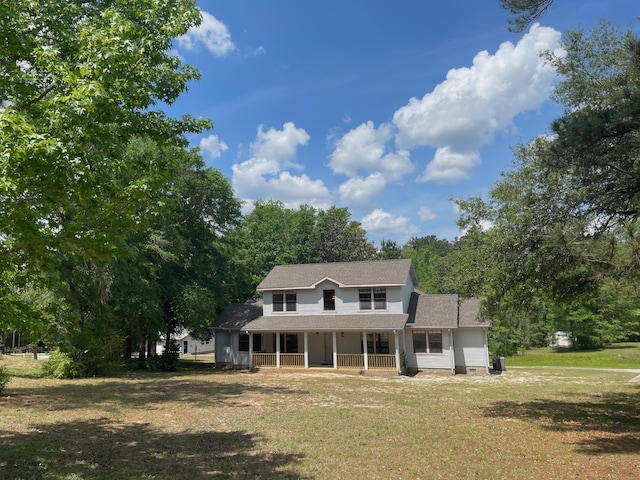 5882 Willow Ln, Crestview, FL 32539 - back of house featuring a porch and a yard