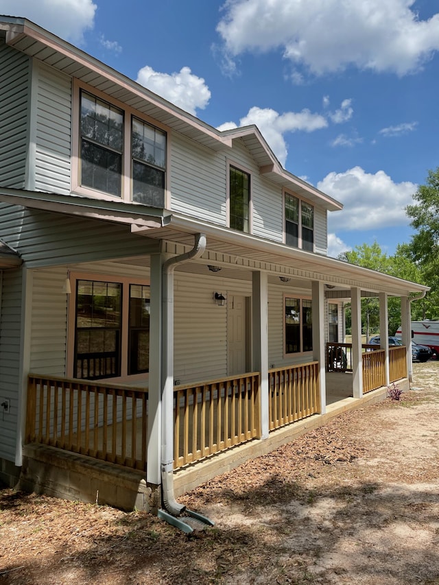 5882 Willow Ln, Crestview, FL 32539 - view of front facade with a porch